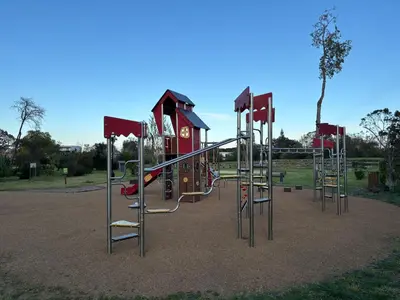 a playground with a slide in a park at 2026 - grand studio avec piscine et plage à 50 m in San-Nicolao
