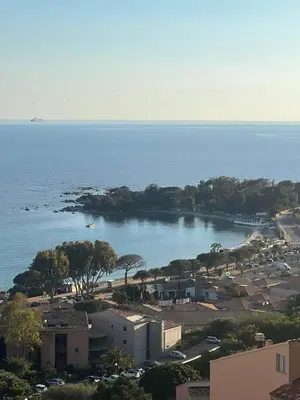 a view of a town and a body of water at Super appartement vue Sanguinaires in Ajaccio