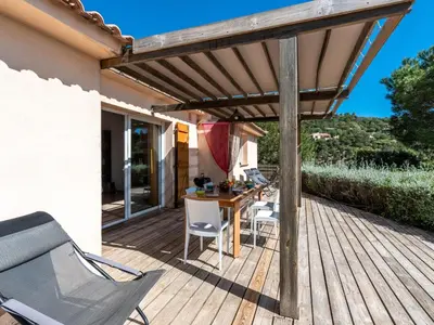 a kitchen with a white refrigerator and a sink at Holiday Home La Girelle by Interhome in Porto-Vecchio