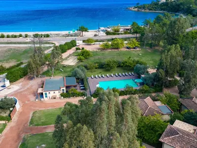 a swimming pool in a villa with a resort at Apartment Residence Marina di Favone- T2- 2-4 pers-3 by Interhome in Conca