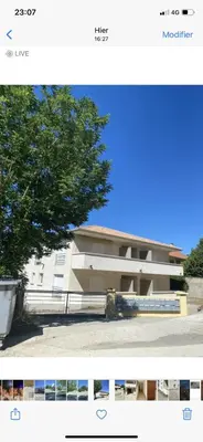 a picture of a building with a tree in front of it at Studio CORTE in Corte