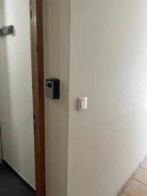 a door with a box on the side of it at Studio CORTE in Corte