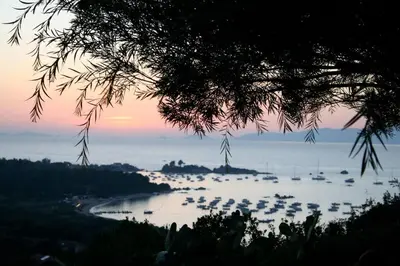 a view of a river with boats in the water at Maison golfe d'Ajaccio: vue mer in Pietrosella
