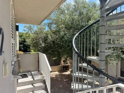 a stairway leading up to a house at Idéal emplacement Cargese 3 in Cargèse