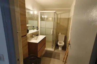 a bathroom with a toilet and a sink and a shower at Calenzana GR20 in Calenzana