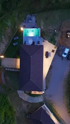 an overhead view of a building with a swimming pool at A CASA DI GHJULIA PISCINE CHAUFFEE PROCHE St FLORENT in Vallecalle