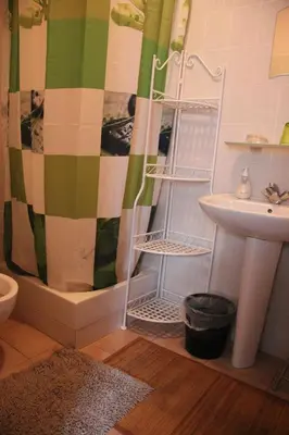 a bathroom with a shower and a sink at Chambre d'Hôte 