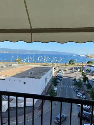 a view of a harbor from a balcony at Appartement Ajaccio vue mer in Ajaccio
