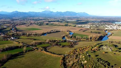 an aerial view of a valley with a river and mountains at Casa Lamaghjone - Villa T4 avec piscine chauffée à 3,5km de la mer in Aléria