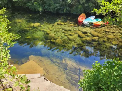 a group of kayaks sitting on top of a river at Evasion in Ventiseri