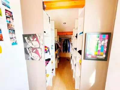 a room with a hallway filled with shoes at Magnifique duplex de 130 m² à Corte (centre ville) in Corte