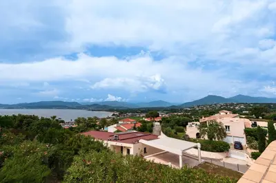 a view of a city and a body of water at L'Orangeraie - Maison avec vue pour 12 voyageurs in Grosseto-Prugna