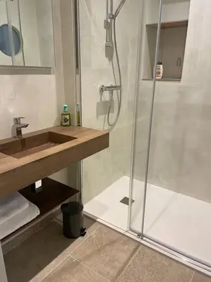 a bathroom with a shower and a sink at Appartement centre ville Corte (F) in Corte
