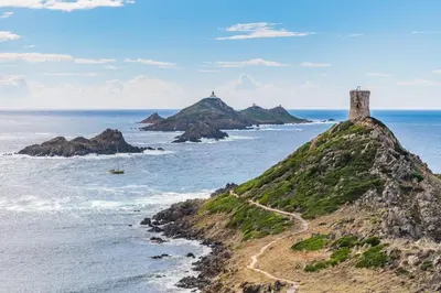 a castle on a hill next to the ocean at Marina - Exceptional Sea View Ruppione - by TGB in Pietrosella