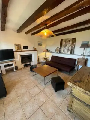 a living room with a couch and a table at Casadimela in Mela