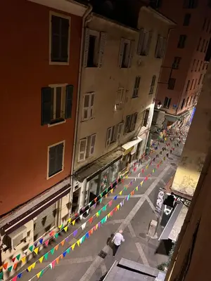 an overhead view of a street with colorful flags at Appartement COSY centre Ajaccio in Ajaccio