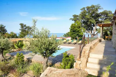 a resort with a swimming pool and a pathway at Résidence Vista Blu in Conca