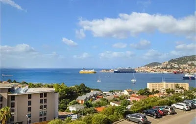 a view of a city with boats in the water at Cozy Apartment In Ajaccio With Wifi in Ajaccio