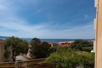 a view of the ocean from a building at Les crêtes , magnifique T2 4 pers Route des Sanguinaires in Ajaccio