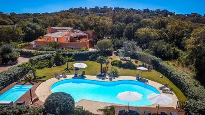 an aerial view of a house with a swimming pool at Residence Les Jardins de Sainte-Lucie 
