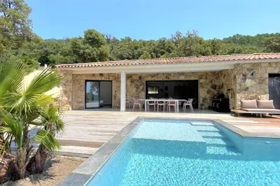 a villa with a swimming pool and a patio at Villa Concarella Di Conca in Conca