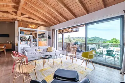 a living room with a couch and chairs at Villa Valle di Corte - Avec piscine et vue mer in Pianottoli-Caldarello