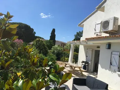 a view of a house with a patio at Appartement Marina di Fiori by Intendance Excellency in Porto-Vecchio