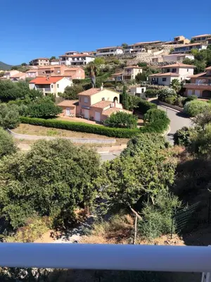 a view of a town from the balcony of a house at Casa campa lumba in Propriano