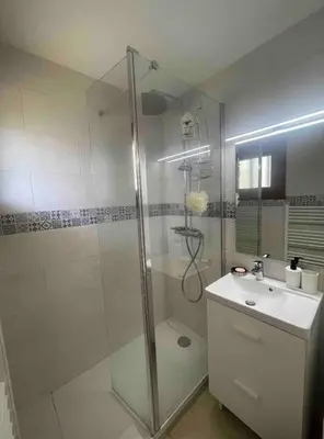 a bathroom with a shower and a sink at Porticcio avec Piscine proche plage in Porticcio