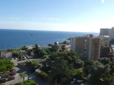 a view of the ocean from a city at Le Rocher Des Sanguinaires in Ajaccio