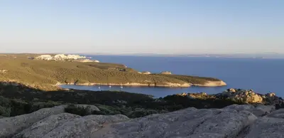 an island in the middle of a large body of water at Casa corsica in Pianottoli-Caldarello