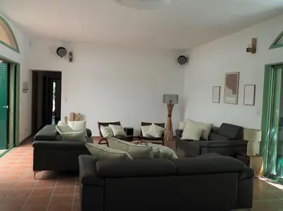 a living room with two couches and a couch at MAMMONA in Bonifacio