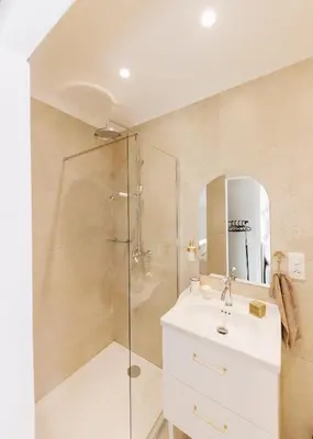 a bathroom with a sink and a shower at A Macina in Porri