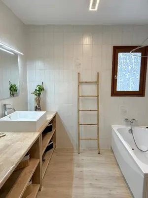 a bathroom with a sink and a bath tub at Villa de charme Porto-Vecchio, Plage à 10 min in San-Gavino-di-Carbini