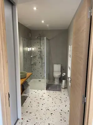 a bathroom with a shower and a toilet in it at T2 très bien équipé vue mer et au calme in Ajaccio