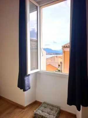 a bathroom with a shower and a toilet and a sink at Spacious cocoon close to the beach in Ajaccio