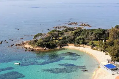 an aerial view of a beach with blue water at Appartement central avec très jolie vue in Ajaccio