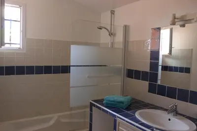a bathroom with a sink and a shower at CASA PALOMBAGGIA - Piscine Chauffée in Porto-Vecchio