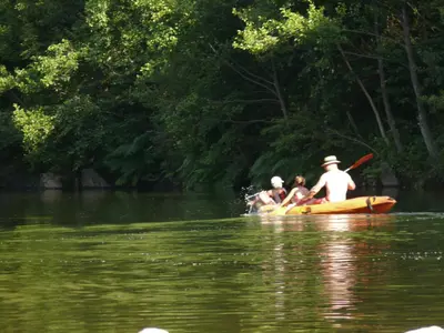 a group of people in a boat on the water at U Sortipiani in Sortipiani
