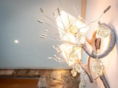 a sculpture of a butterfly on a wall at Villa AzaiTu Suites in Porto-Vecchio