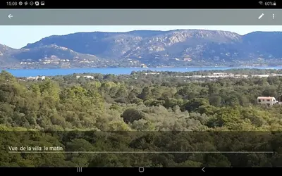 a view of a lake and some trees and mountains at Villa ANCHORAGE vue mer panoramique Roof top Piscine a debordement in Porto-Vecchio