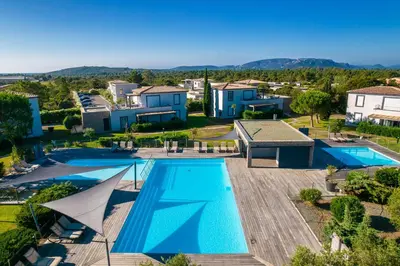 an aerial view of a villa with a swimming pool at Résidence Pierre & Vacances Premium Les Villas de Porto-Vecchio in Porto-Vecchio