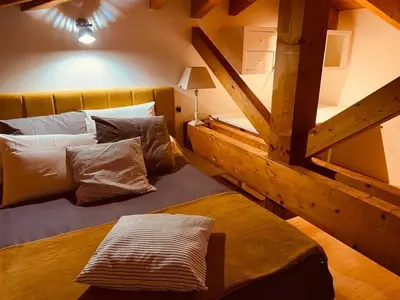 a room with two beds and a bed with at Villa Santoni 2 in Grosseto-Prugna