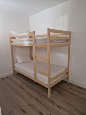 a couple of bunk beds in a room at Résidence Fiori di Cala Rossa in Lecci