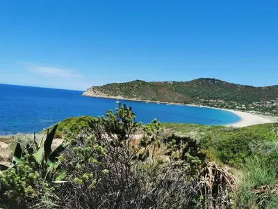 a view of a beach and the ocean at Village de vacances Paese di Lava, Grand Ajaccio in Alata