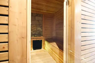 a wooden cabin with a sauna at Chambre d'hôte Casa Maredda in Porticcio
