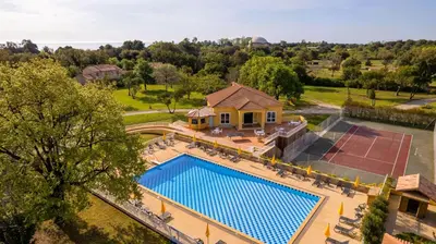 an aerial view of a house with a swimming pool at Residence Mare e Sole in Taglio-Isolaccio
