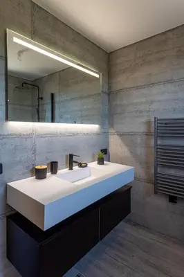 a bathroom with a white sink and a mirror at Villa Kalinas Corse 4 étoiles in Sari Solenzara