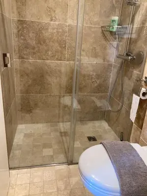 a bathroom with a shower with a toilet at Studio à 200m du centre ville de Porto Vecchio,jardin, terrasse parking privé in Porto-Vecchio