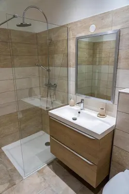 a bathroom with a sink and a shower at A Suara in Ghisonaccia